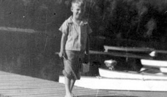 Family fishing trip to Minnesota with our first car. Fisherman at age 5.