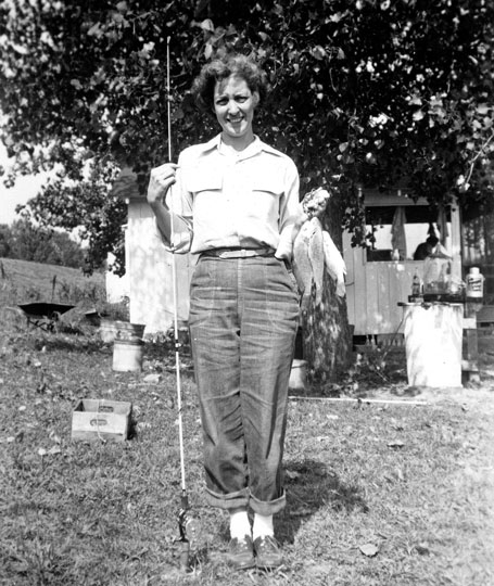The Illinois River levee is in the background the catch is standard for Macoupin creek just behind the levee, a dearest and most loving cousin shares in 50s family fishing customs and 50s childhood memories of forests creeks and ponds