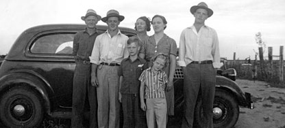 Immer family on the home front backroad on the family farm at Highland Illinois my father was already in service in the south pacific uncle Fred later served in the Air Force in Germany Eugene later served as a military policeman the dusty dirt road location on an Illinois prairie became the location of my 50s childhood backroad memories