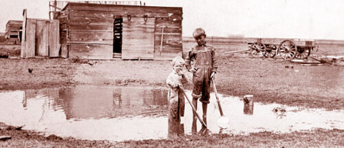 A Greatest Generation child creates toys from a puddle after a Colorado plains rainstorm in 1925. Revelations from an Alfred Lord Tennyson poem, The Gleam, are ten years in the future.