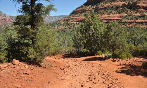 Family backroad adventure extends 50s childhood backroad memories on a dusty dirt road to Devils Bridge in Sedona Arizona